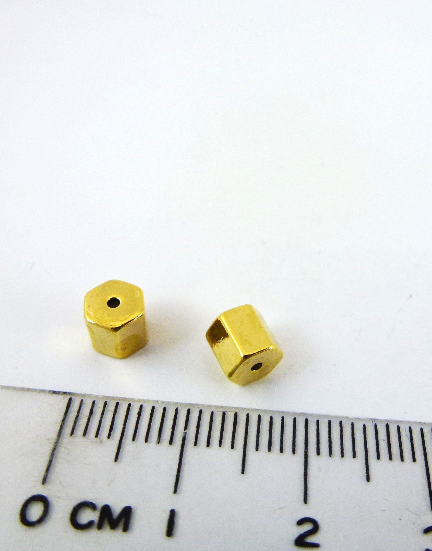 5MM銅鍍金色單孔六角柱矽膠擋珠