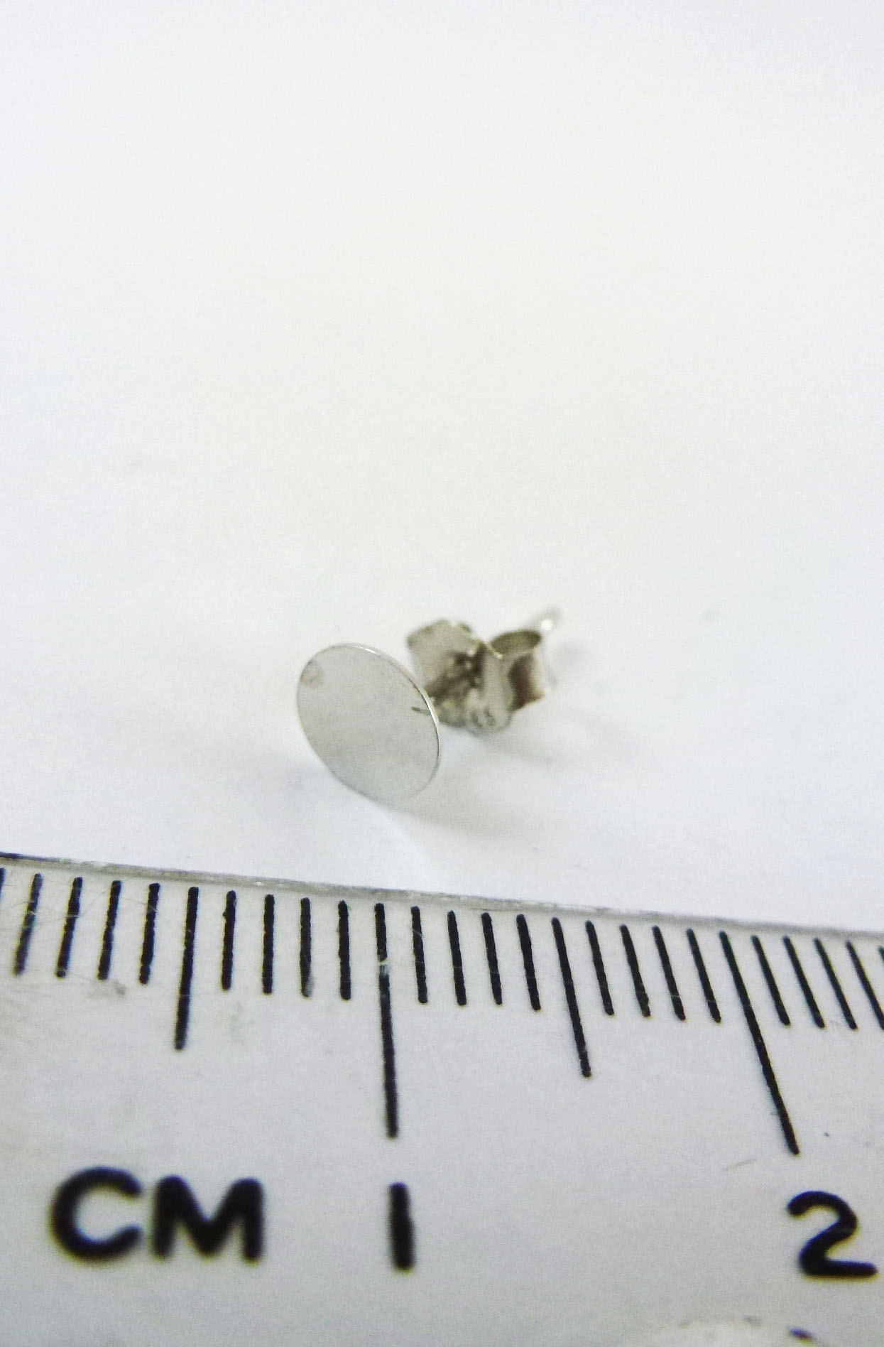 5mm純銀鍍正白K圓平盤耳針