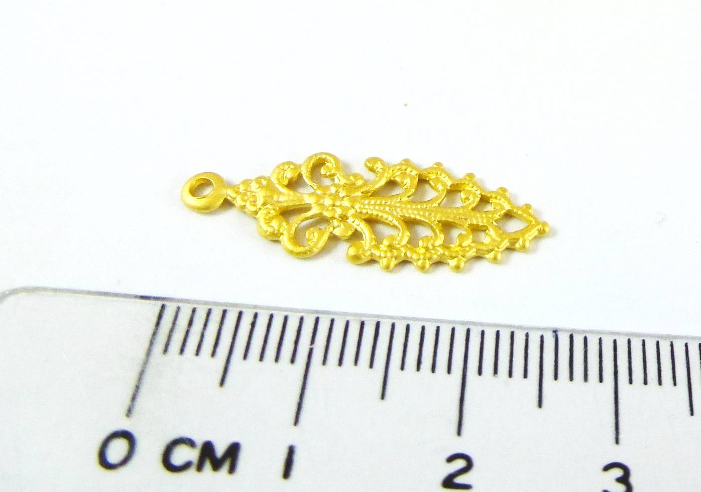 銅鍍霧金色單孔花飾紋匕首