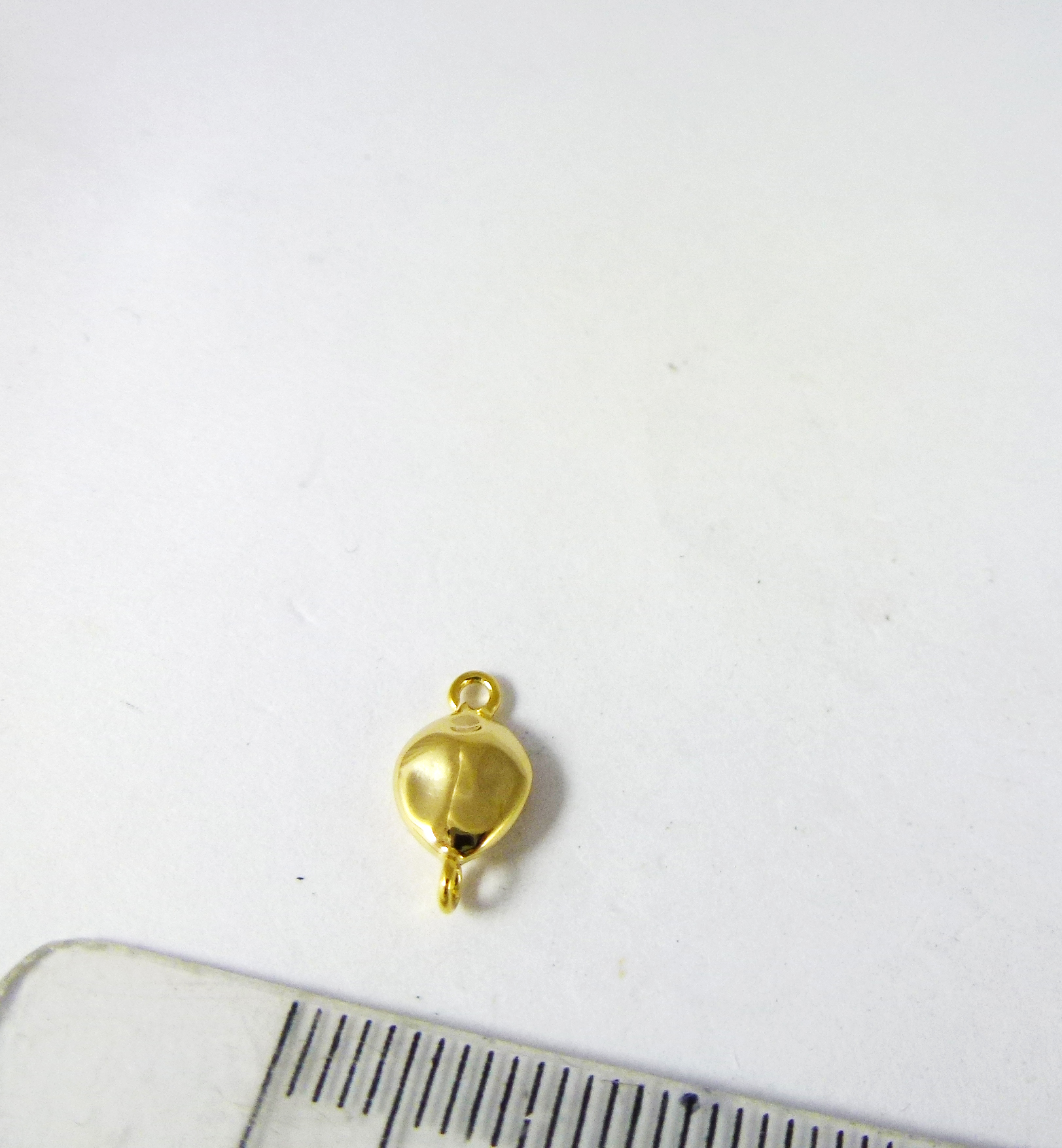 7mm銅鍍金色雙孔不規則凹痕橢圓