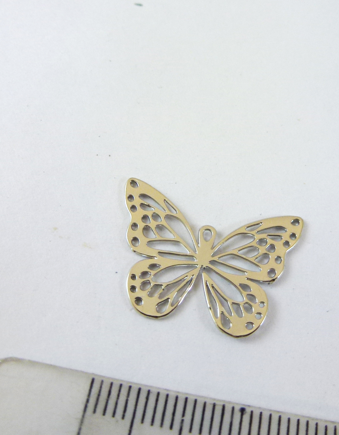23mm合金鍍白K單孔鏤空蝴蝶
