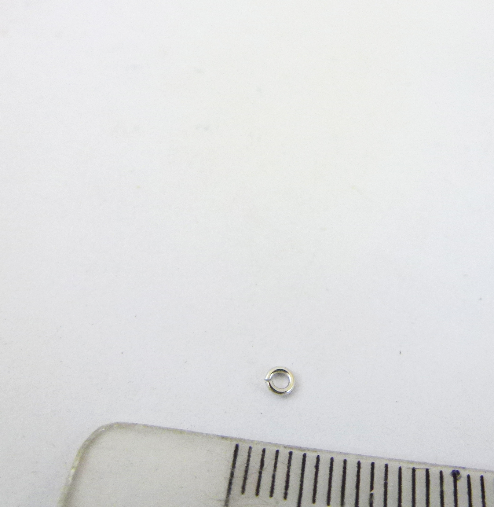 0.6X2.5MM純銀鍍白K單圈