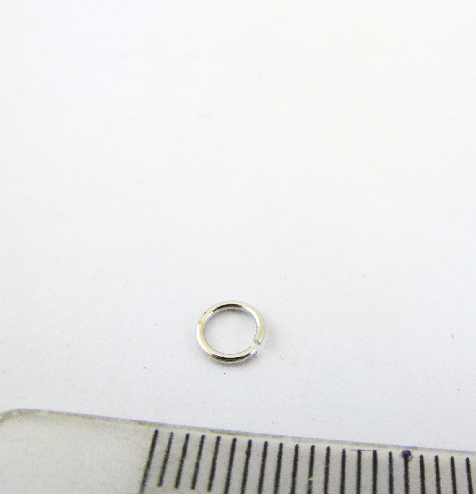 0.7X5MM純銀鍍白K單圈