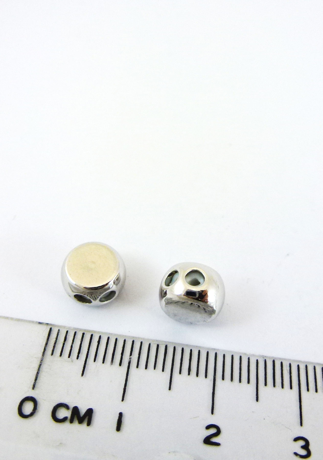 8MM銅鍍金色雙孔圓形矽膠擋珠