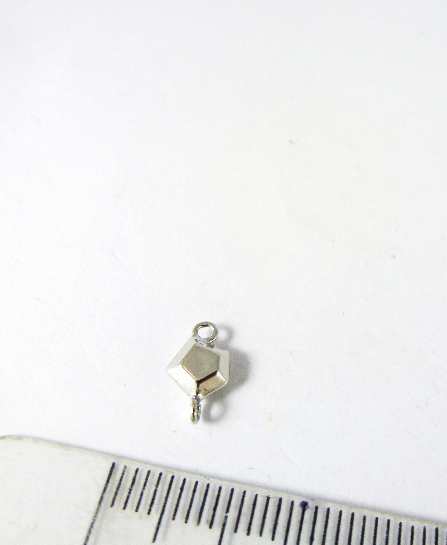 5MM銅鍍白K雙孔五邊形