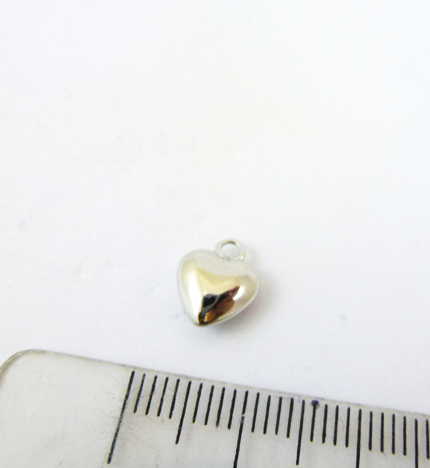 8mm銅鍍白K單孔立體桃心
